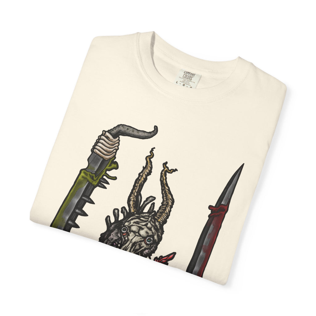 Hand-drawn Item Selection #2 t-shirt from Freaky Features showing a reptilian monster holding a chainsaw sword, bloody dagger and twisted staff on cream tee

