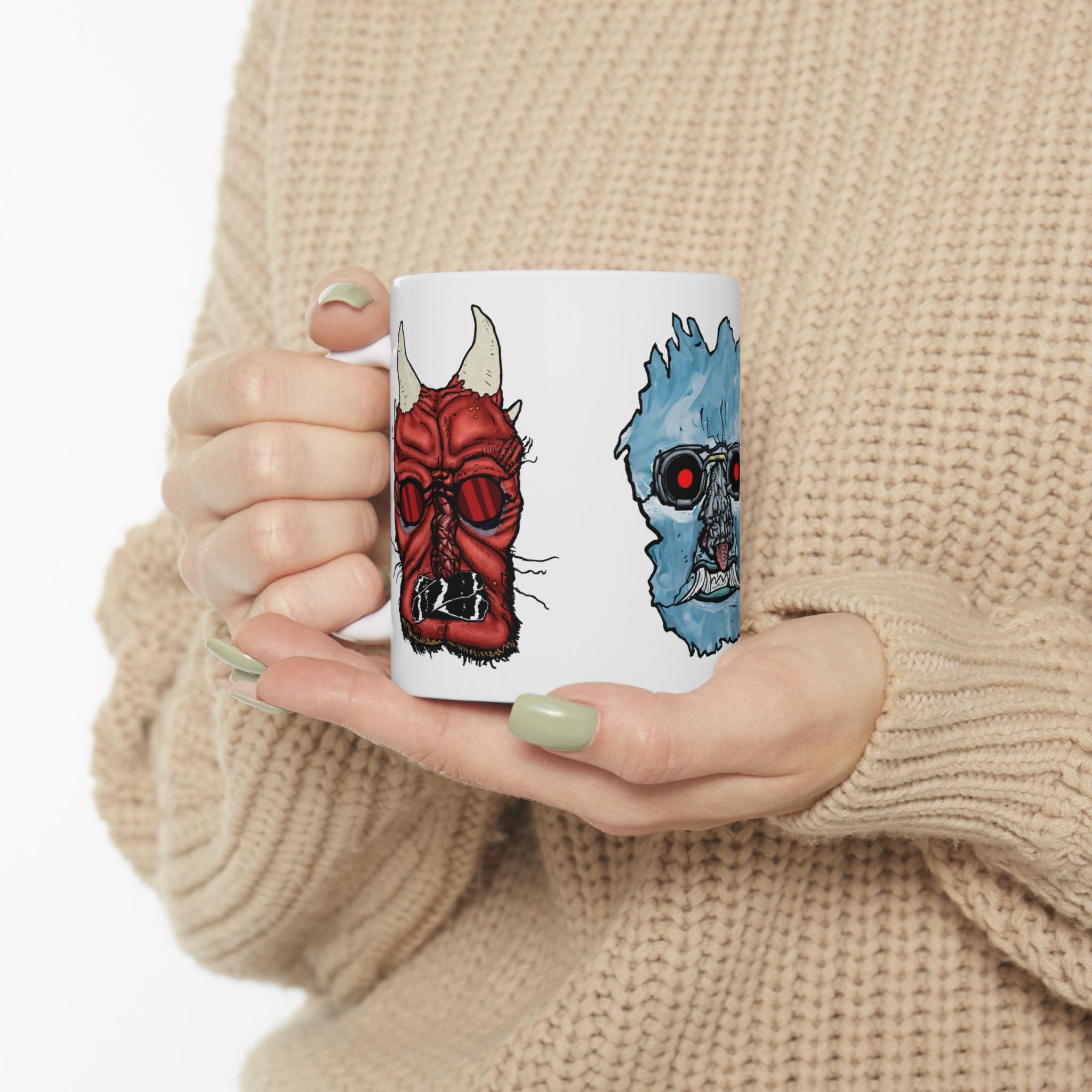 Freaky Features Iceman Devil Fishman mug showing three monster designs: blue icy skull with red goggles, red horned demon, and grotesque fishman head on white ceramic mug


