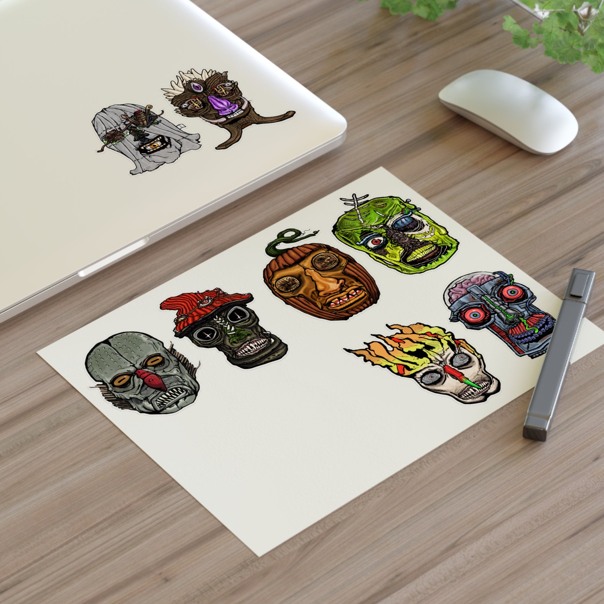 Freaky Features Sticker Sheet Set #2, transparent die-cut sheet with 8 hand-drawn monster heads including Fishman, Mushroom Boy, PumpkinJack, Radioactive Blob, Ghost, Flaming Skull, and Robo Bobo
