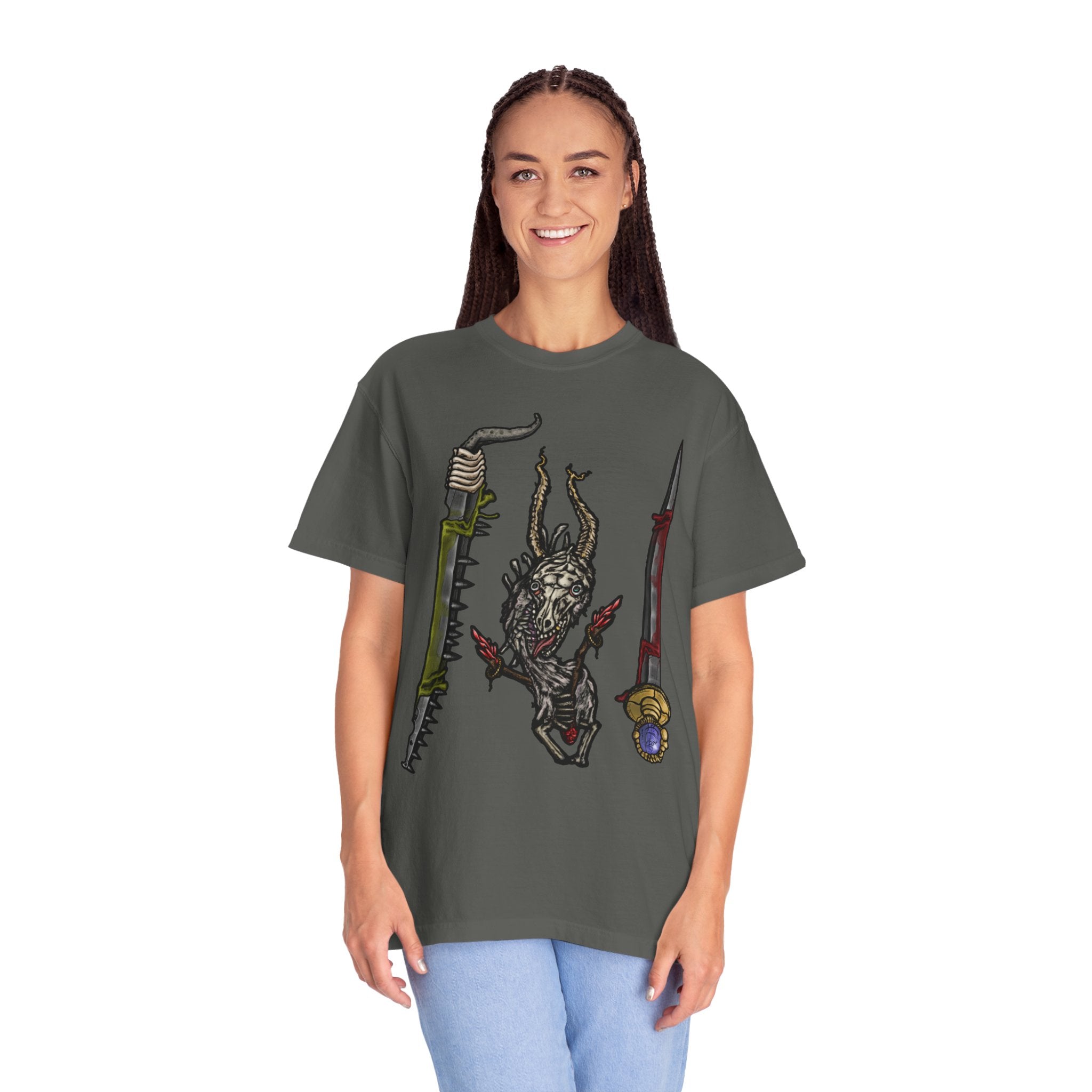 Hand-drawn Item Selection #2 t-shirt from Freaky Features showing a reptilian monster holding a chainsaw sword, bloody dagger and twisted staff on cream tee

