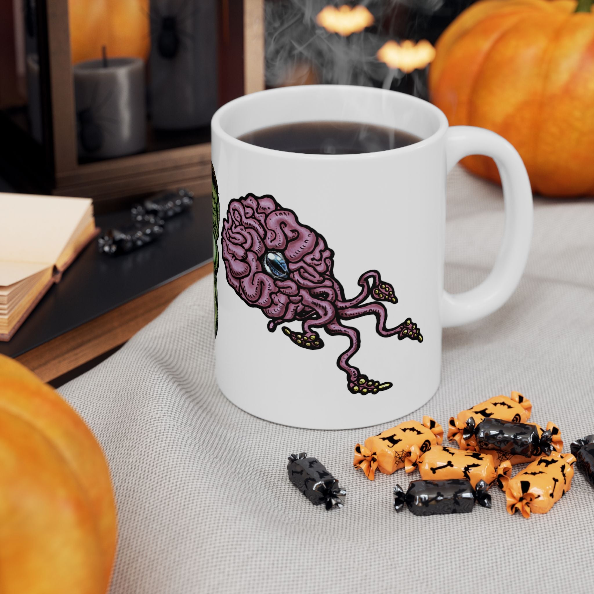 Freaky Features Frankie & the Brians mug showing three monster designs: Franky ( Frankenstein ), purple sad brain with tentacles, and floating brain with glassy eye
