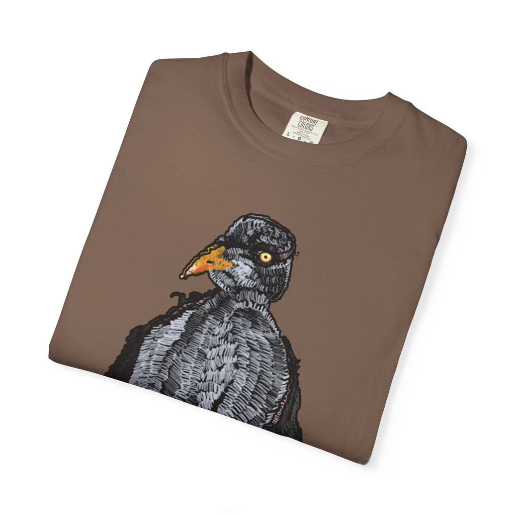Hand-drawn crocheted staring seagull t-shirt with textured feathers, intense yellow eye and orange legs on Comfort Colors tee from PizzaBytes collection
