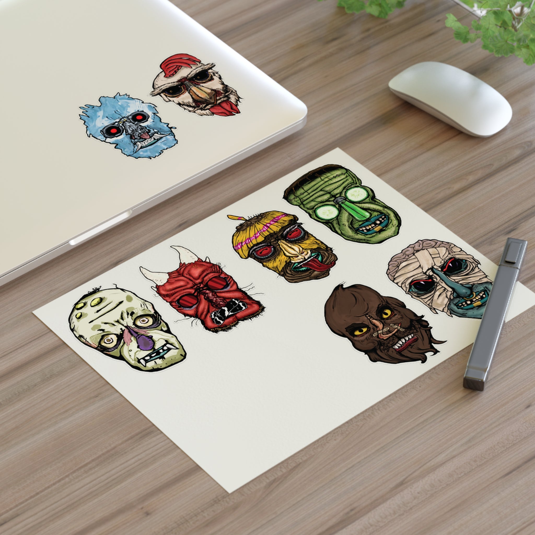 Freaky Features Sticker Sheet Set #1 , transparent die-cut sheet with 8 hand-drawn monster heads from the Freaky Features collection