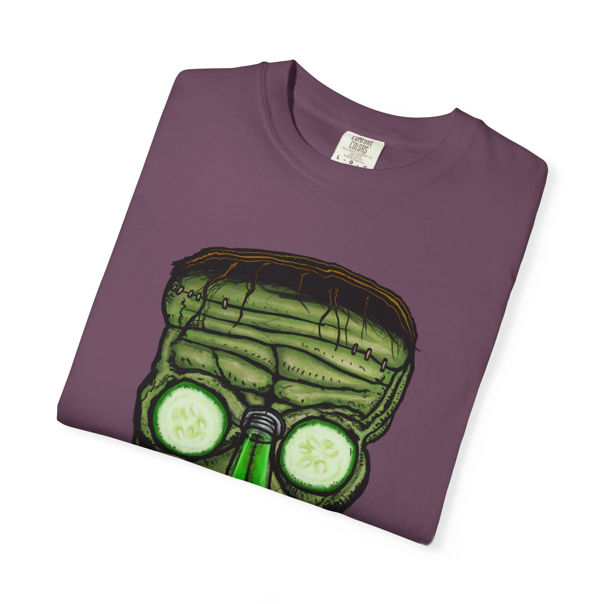 Freaky Features Franky t-shirt, front shows Frankenstein-style monster head with cucumber eyes and poison vial nose, back shows monster-headed pizza box with green pizza frisbee