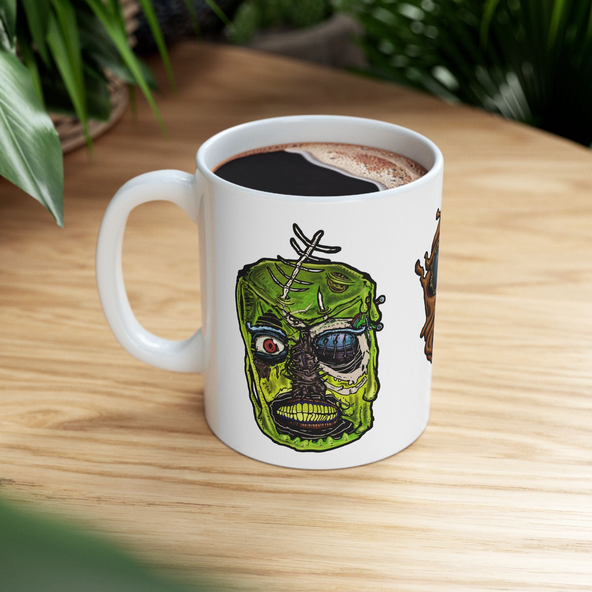 Freaky Features Sandman Radioactive Blob Shaman mug showing three monster designs: melting chocolate head with ice cream nose, neon green radioactive blob skull, and tribal shaman mask on white ceramic mug

