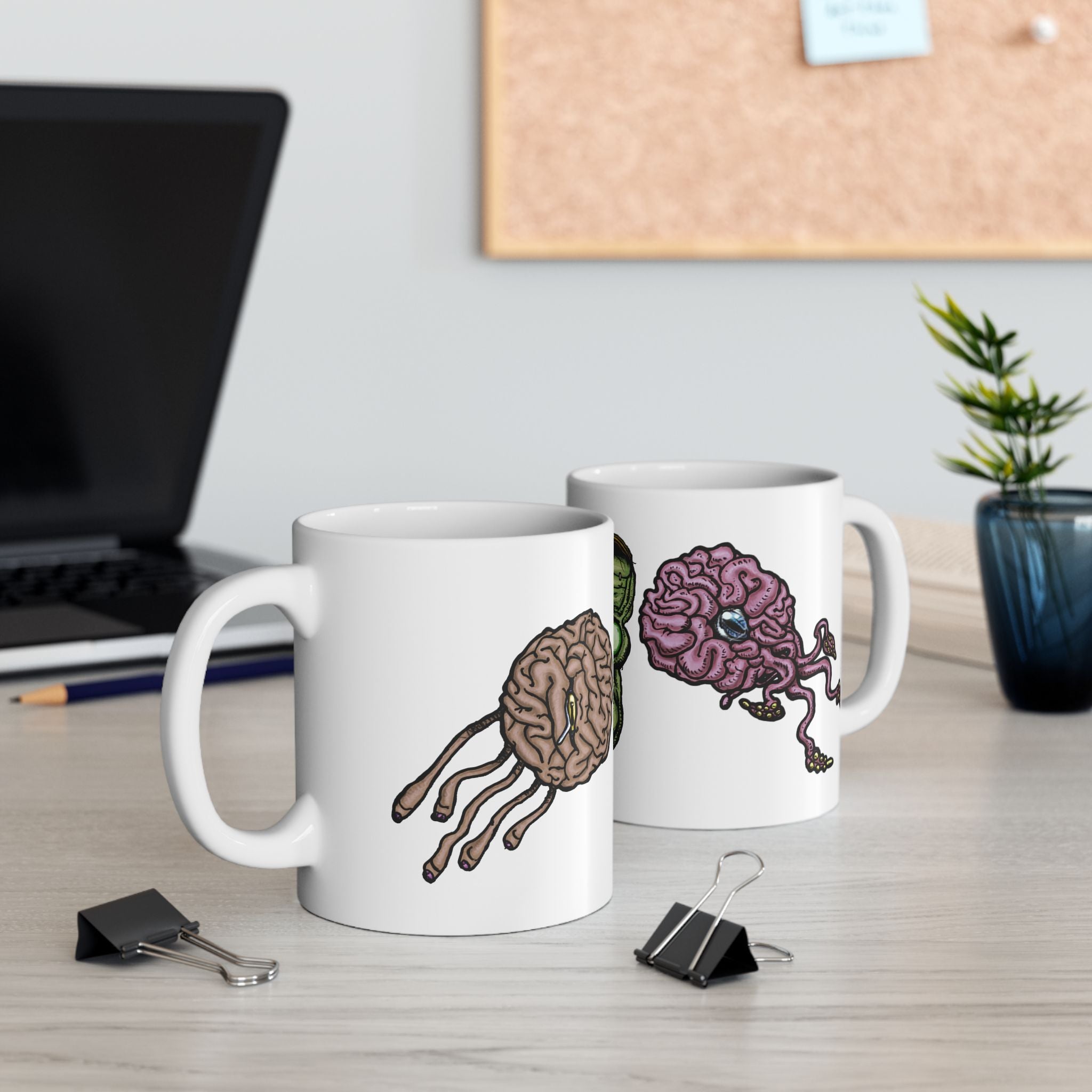 Freaky Features Frankie & the Brians mug showing three monster designs: Franky ( Frankenstein ), purple sad brain with tentacles, and floating brain with glassy eye
