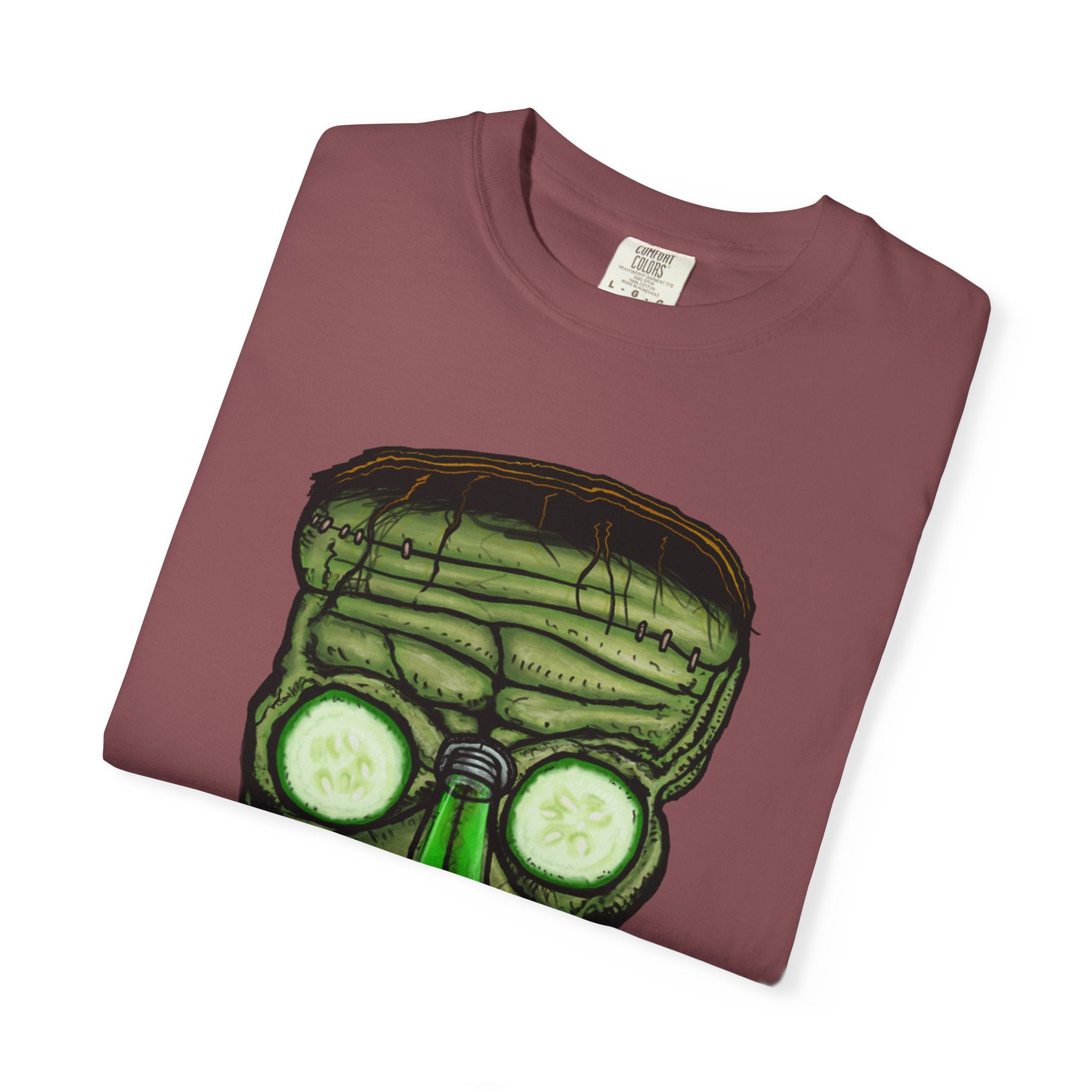 Freaky Features Franky t-shirt, front shows Frankenstein-style monster head with cucumber eyes and poison vial nose, back shows monster-headed pizza box with green pizza frisbee