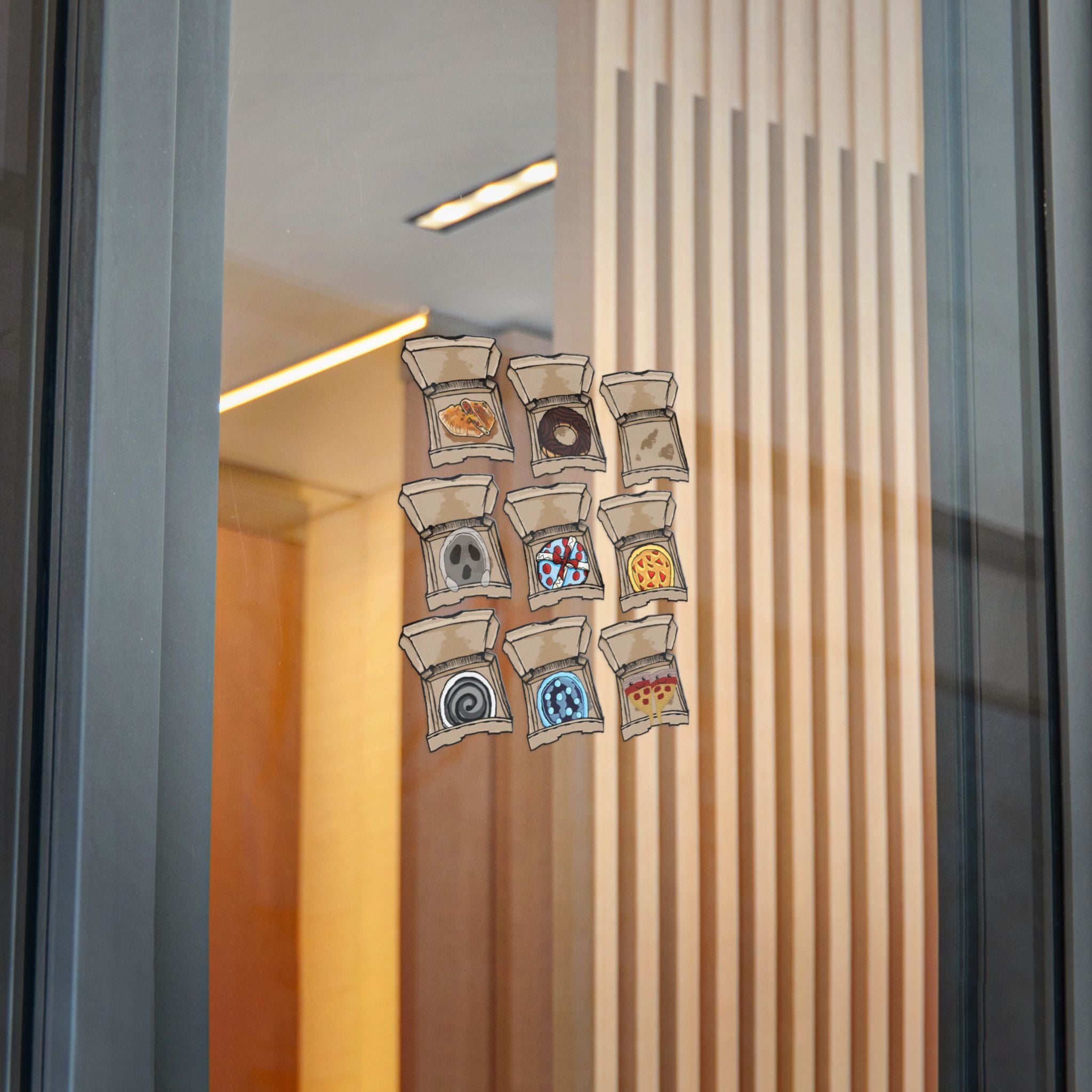Transparent die-cut sticker set showing 9 open pizza boxes with weird designs: calzone, chocolate donut, ghost pizza, knitted happy slices, ice pizzal and more from PizzaBytes Set #3
