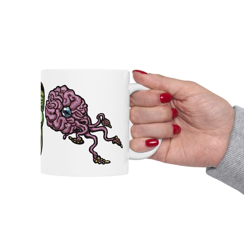 Freaky Features Frankie & the Brians mug showing three monster designs: Franky ( Frankenstein ), purple sad brain with tentacles, and floating brain with glassy eye
