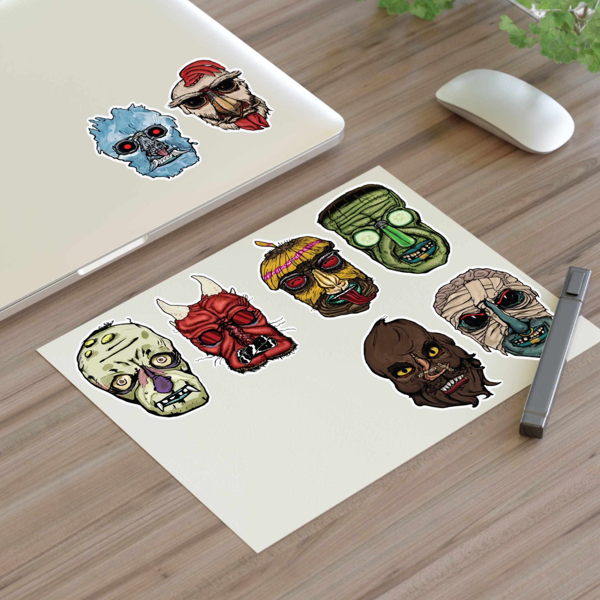 Freaky Features Sticker Sheet Set #1 , transparent die-cut sheet with 8 hand-drawn monster heads from the Freaky Features collection