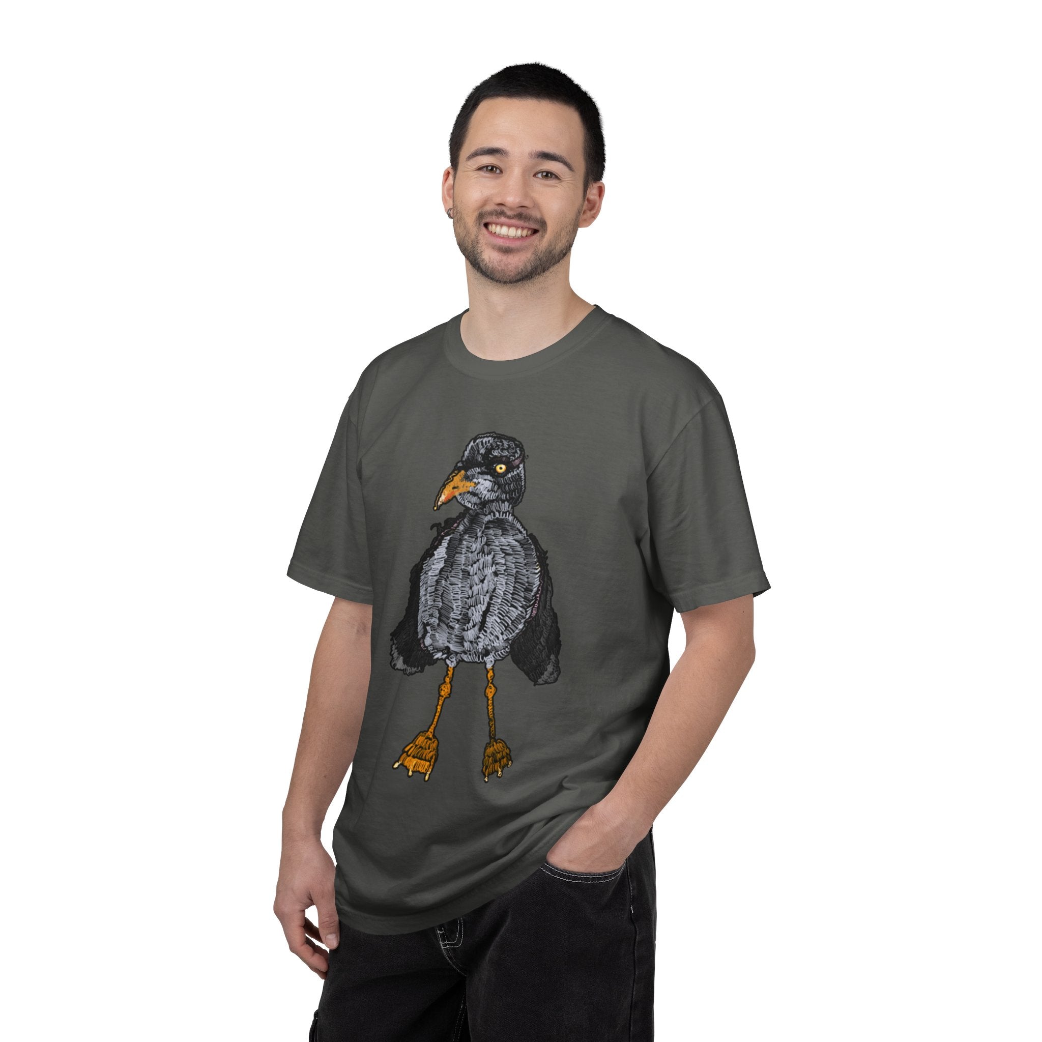 Hand-drawn crocheted staring seagull t-shirt with textured feathers, intense yellow eye and orange legs on Comfort Colors tee from PizzaBytes collection
