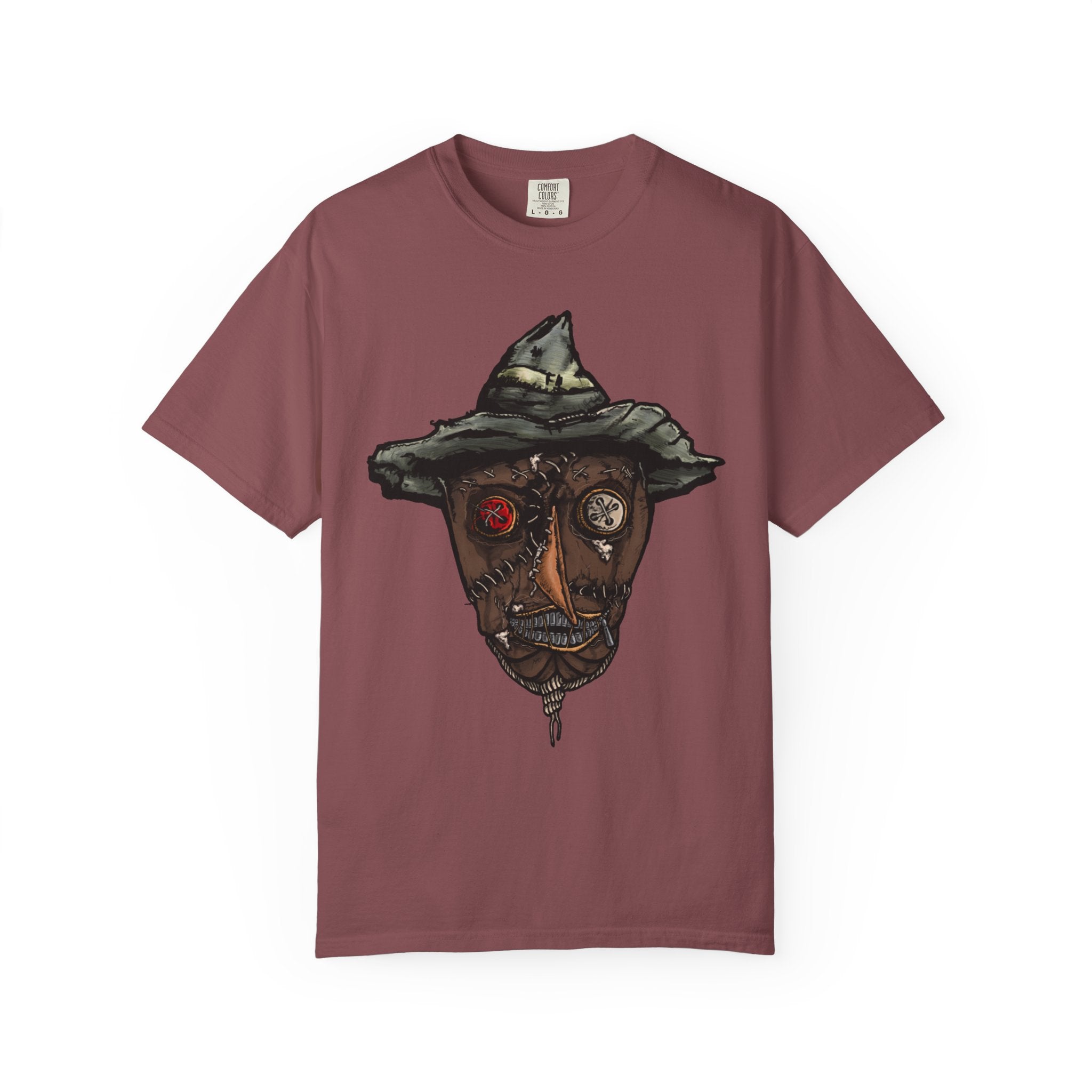 Freaky Features Scarecrow t-shirt, front shows creepy scarecrow head with witch hat and mismatched eyes, back shows open pizza box with lattice cherry pie
