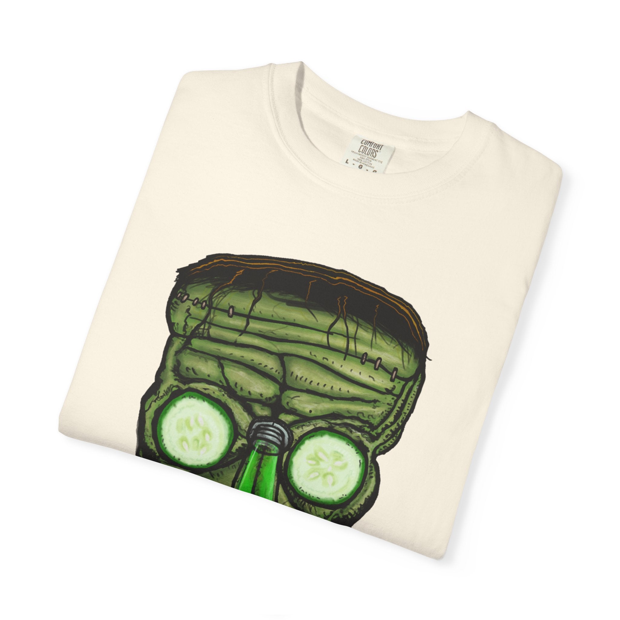 Freaky Features Franky t-shirt, front shows Frankenstein-style monster head with cucumber eyes and poison vial nose, back shows monster-headed pizza box with green pizza frisbee