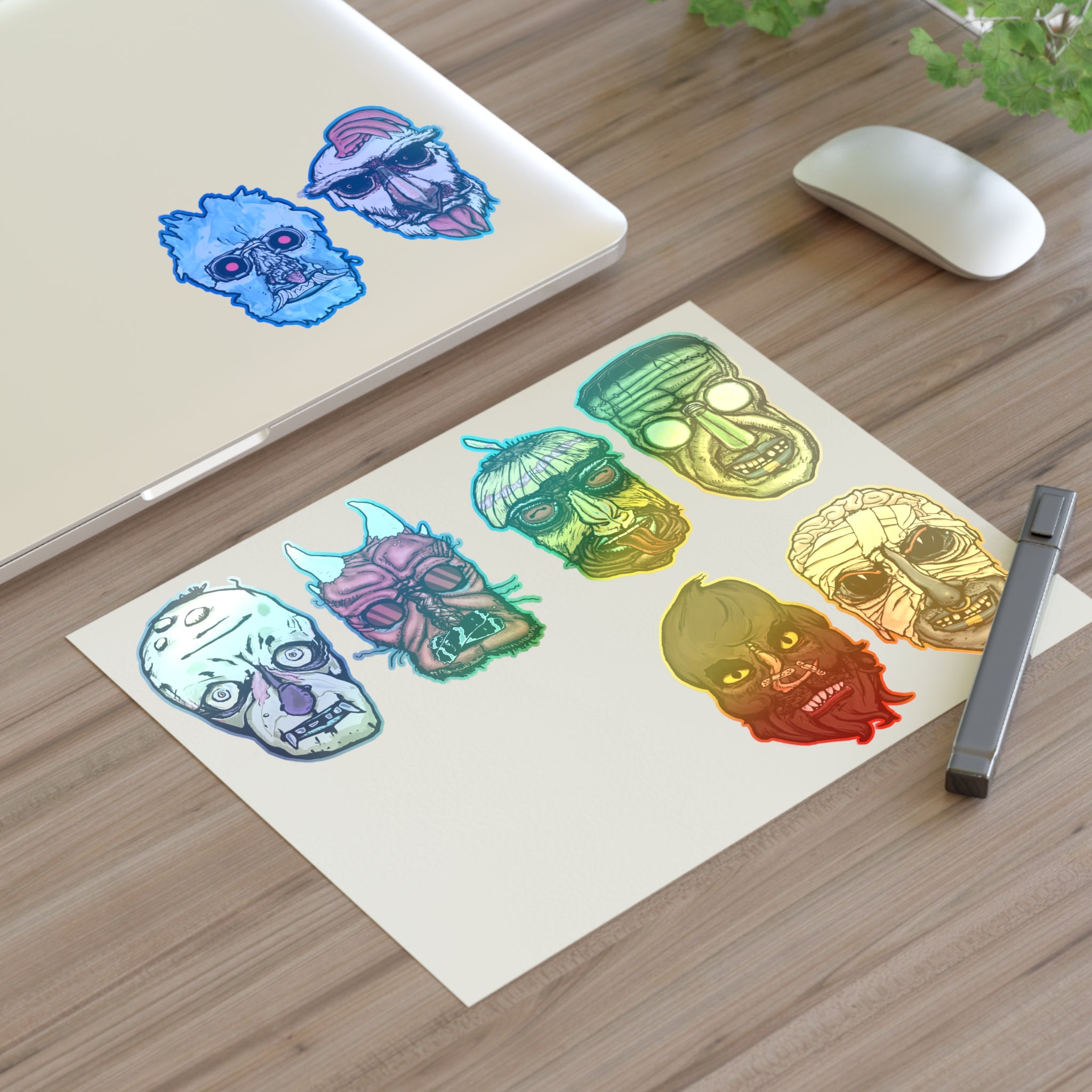 Freaky Features Sticker Sheet Set #1 , transparent die-cut sheet with 8 hand-drawn monster heads from the Freaky Features collection