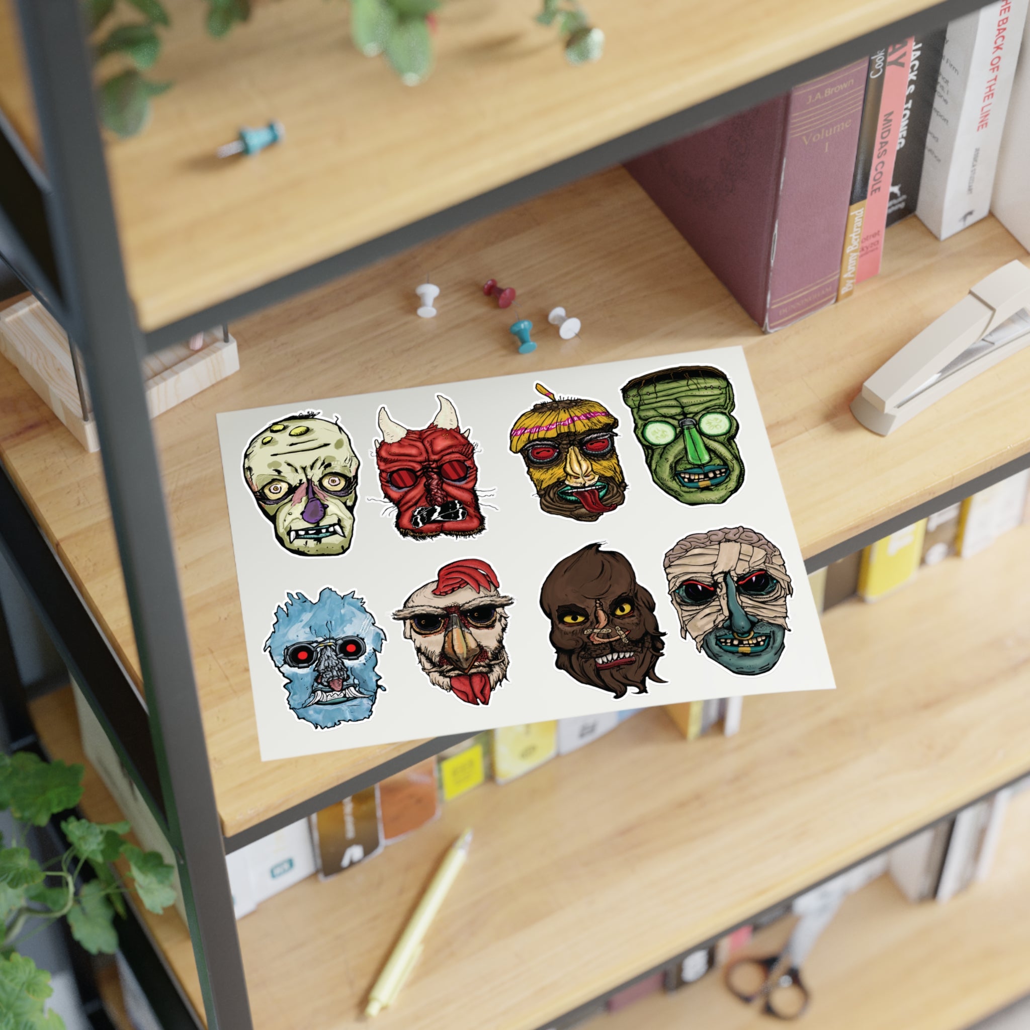 Freaky Features Sticker Sheet Set #1 , transparent die-cut sheet with 8 hand-drawn monster heads from the Freaky Features collection