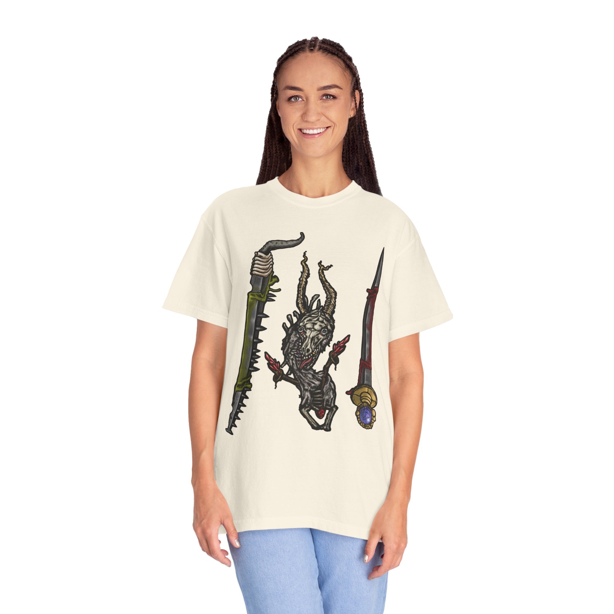 Hand-drawn Item Selection #2 t-shirt from Freaky Features showing a reptilian monster holding a chainsaw sword, bloody dagger and twisted staff on cream tee

