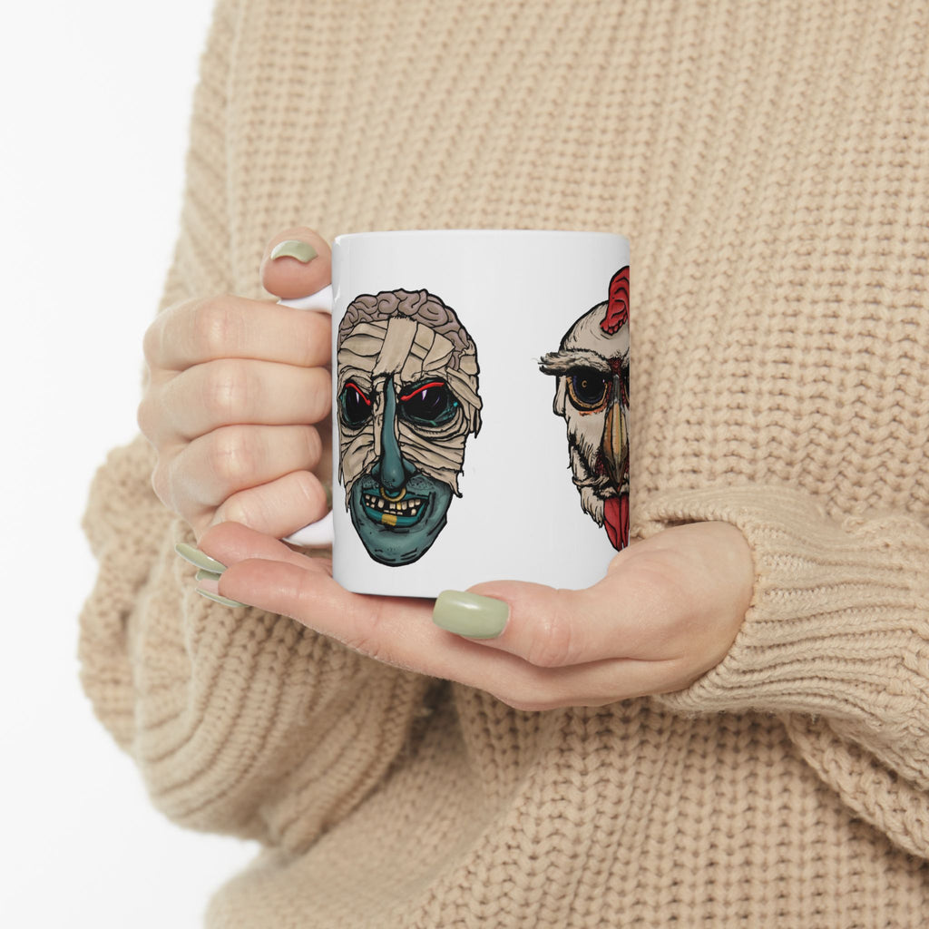 Freaky Features Mummy Chicken Mushroom mug showing three monster designs: bandaged mummy with exposed brain, paranoid rooster with sunglasses, and multi-eyed mushroom skull on white ceramic mug
