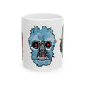 Freaky Features Iceman Devil Fishman mug showing three monster designs: blue icy skull with red goggles, red horned demon, and grotesque fishman head on white ceramic mug

