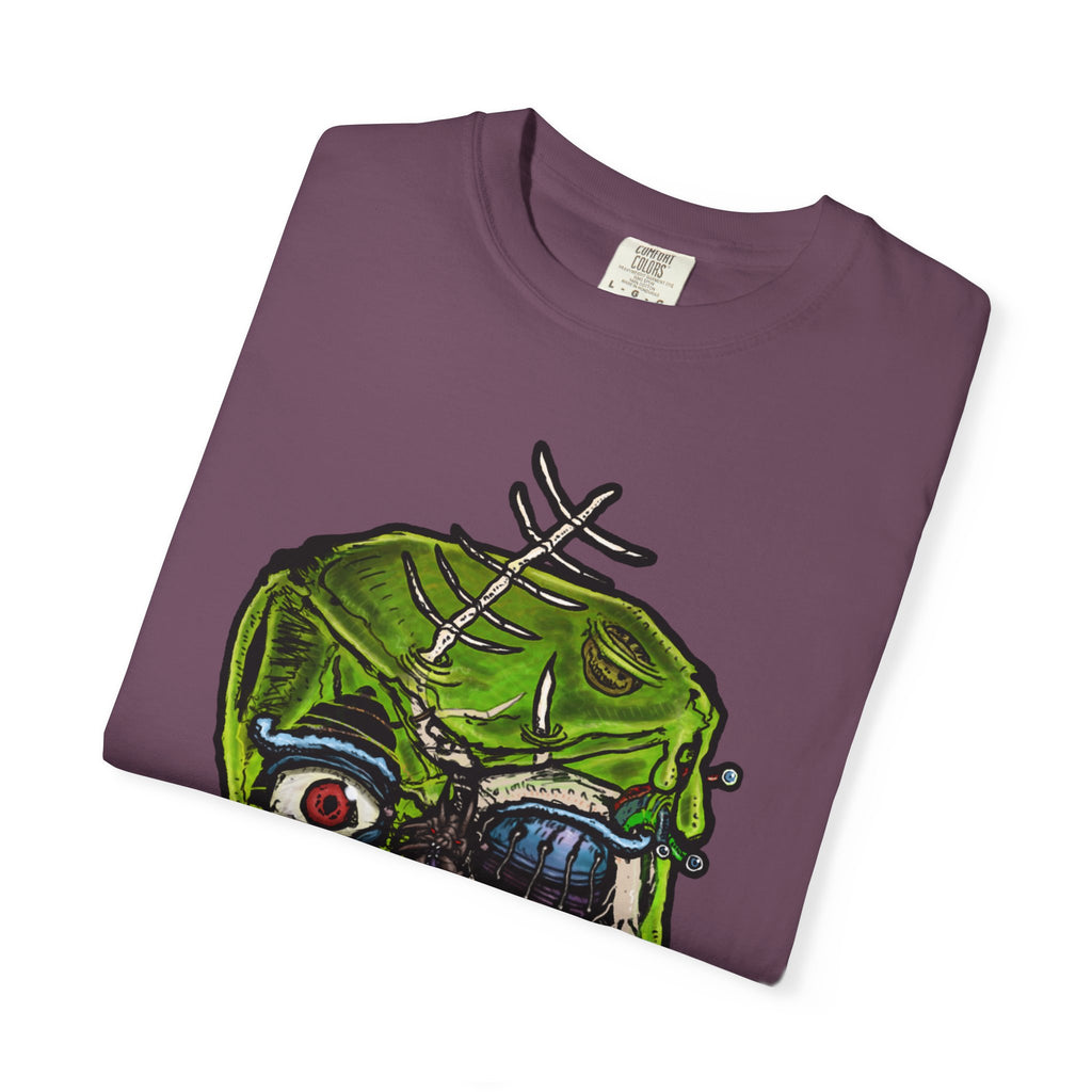Freaky Features Radioactive Blob t-shirt, front shows neon green radioactive blob monster with cracked skull and glowing eyes, back shows open pizza box with glowing green jelly
