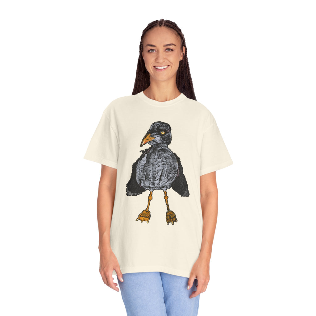 Hand-drawn crocheted staring seagull t-shirt with textured feathers, intense yellow eye and orange legs on Comfort Colors tee from PizzaBytes collection
