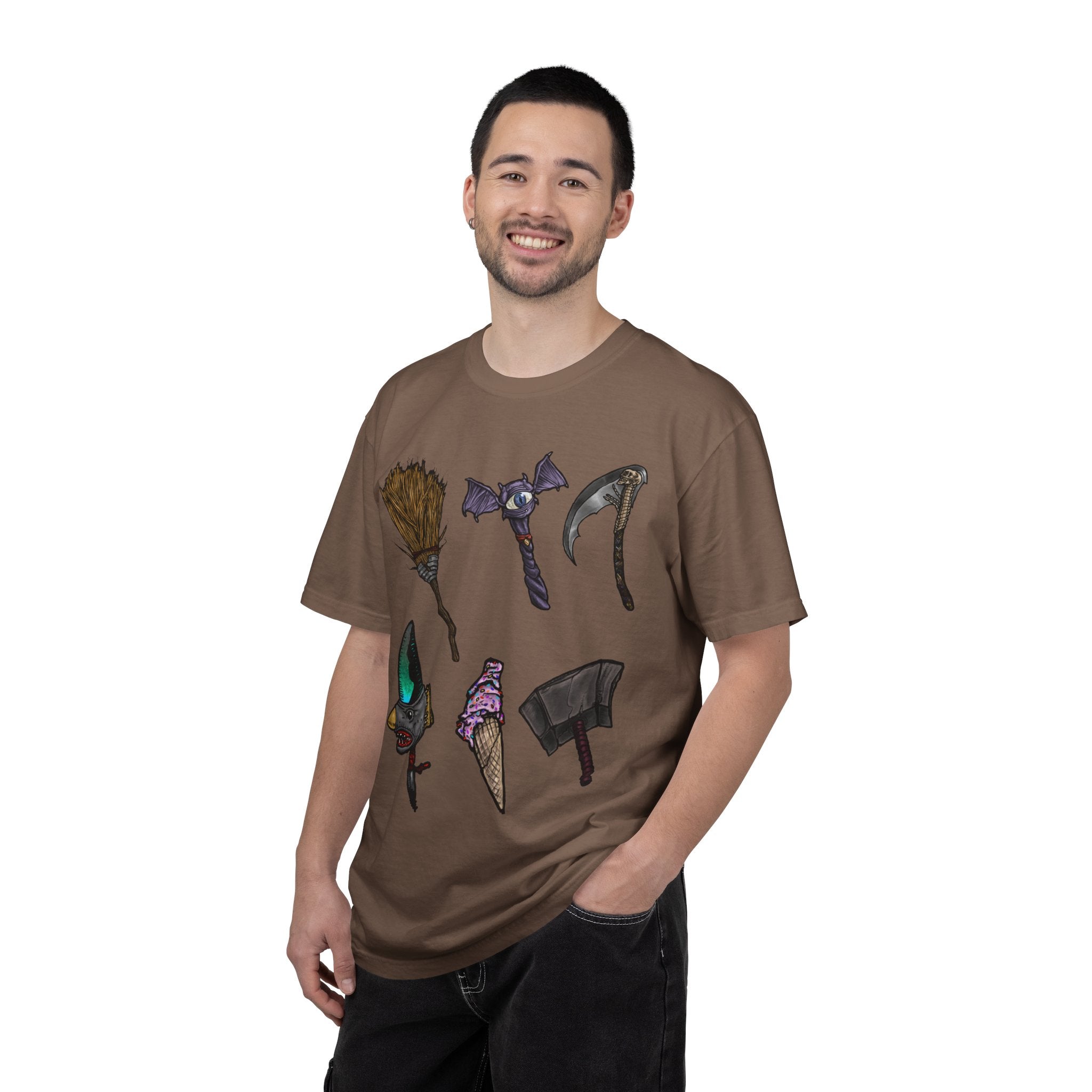 Hand-drawn Item Selection #1 t-shirt from Freaky Features showing a collection of monster weapons: broom, bat staff, skeletal scythe, shark dagger, ice cream cone and war hammer on dark gray tee
