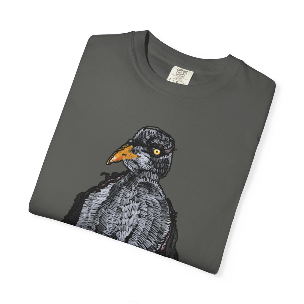 Hand-drawn crocheted staring seagull t-shirt with textured feathers, intense yellow eye and orange legs on Comfort Colors tee from PizzaBytes collection

