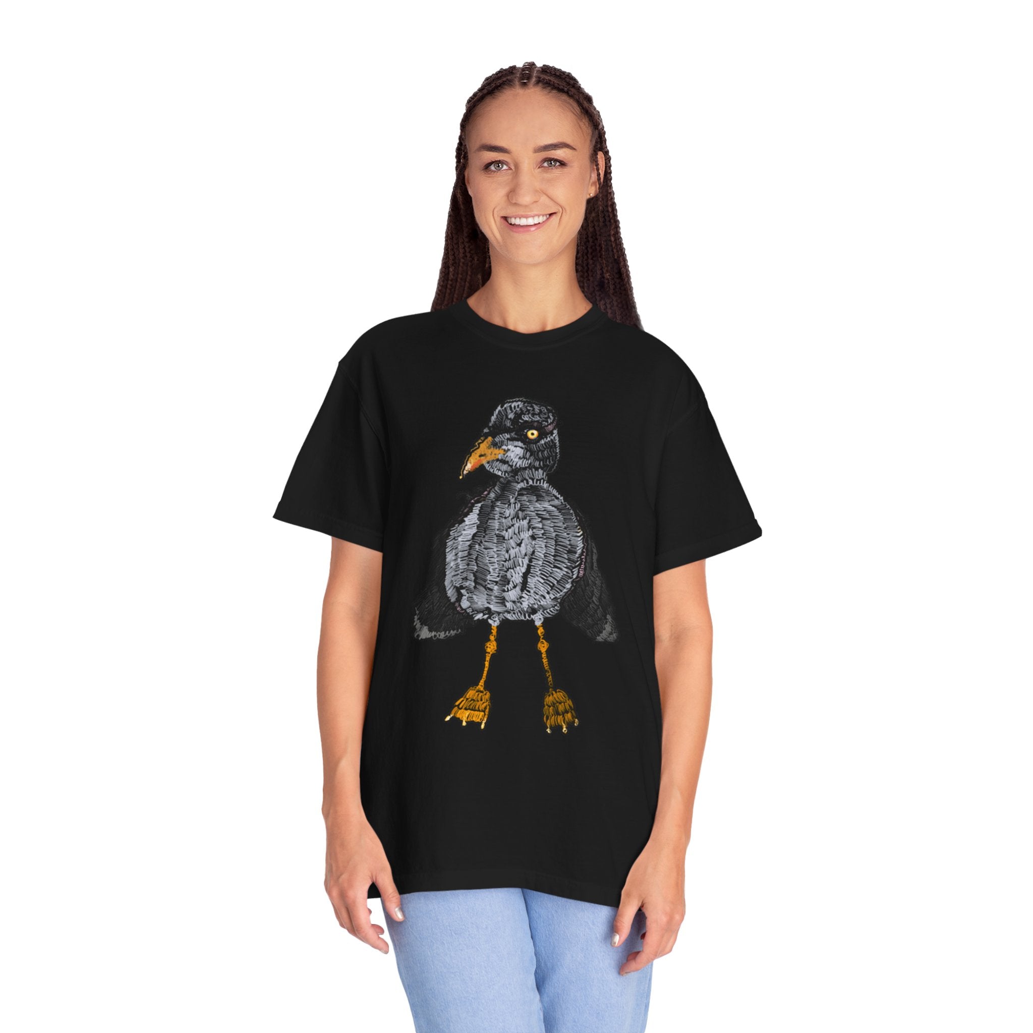 Hand-drawn crocheted staring seagull t-shirt with textured feathers, intense yellow eye and orange legs on Comfort Colors tee from PizzaBytes collection
