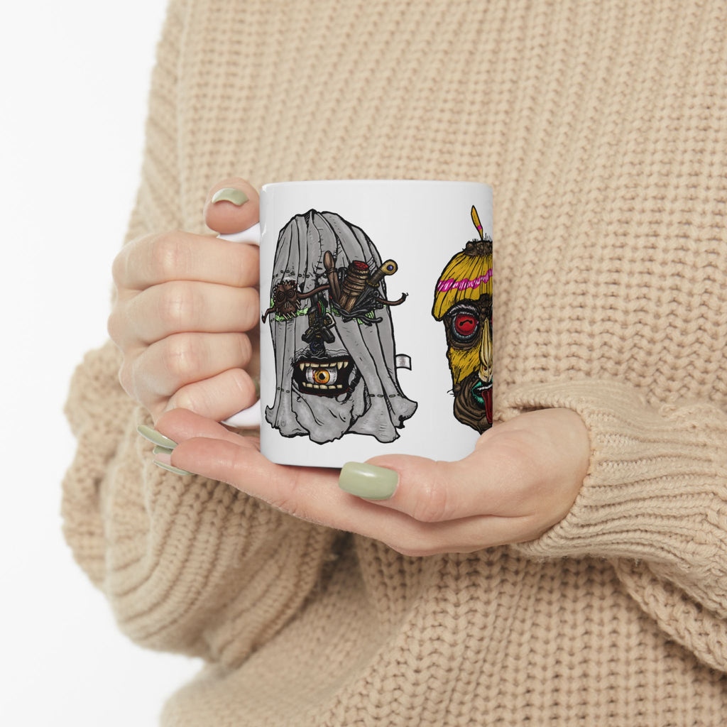 Freaky Features Ghost HorrorBird Flaming Skull mug showing three monster designs: creepy ghost with weapons, horror rooster, and flaming skull with chili nose on white ceramic mug