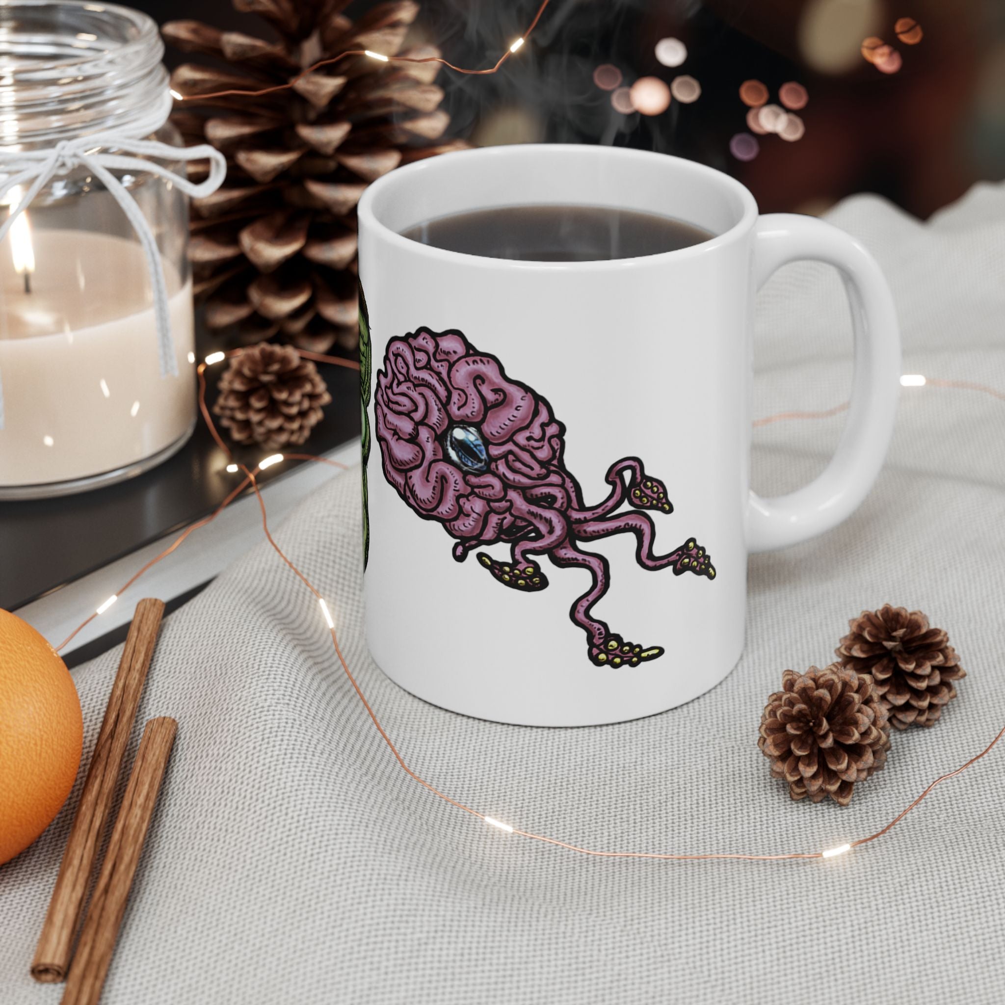 Freaky Features Frankie & the Brians mug showing three monster designs: Franky ( Frankenstein ), purple sad brain with tentacles, and floating brain with glassy eye
