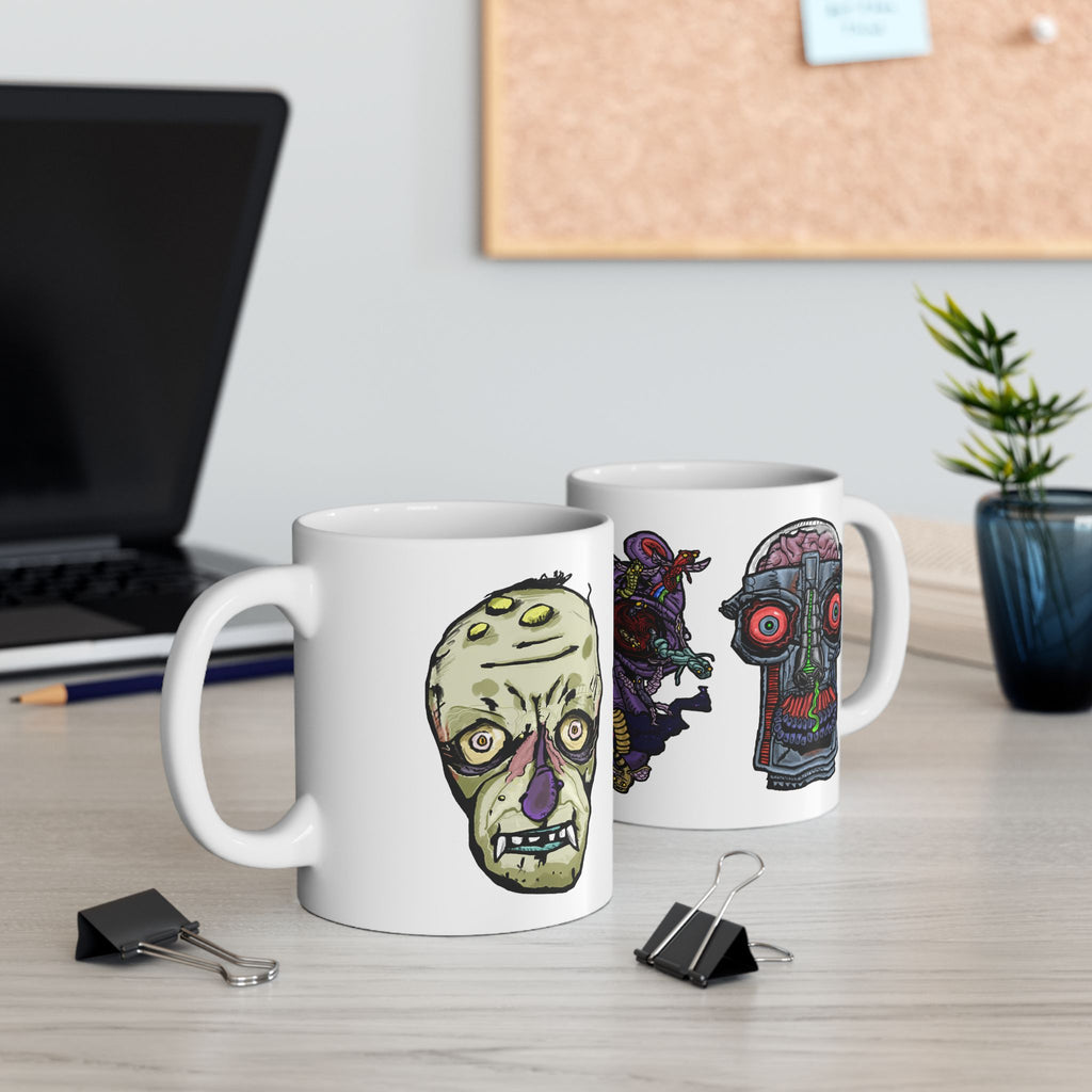 Freaky Features Gremlin Alien Robot mug showing three monster designs: wild-haired gremlin, purple alien swarm, and cybernetic robot skull with exposed brain on white ceramic mug
