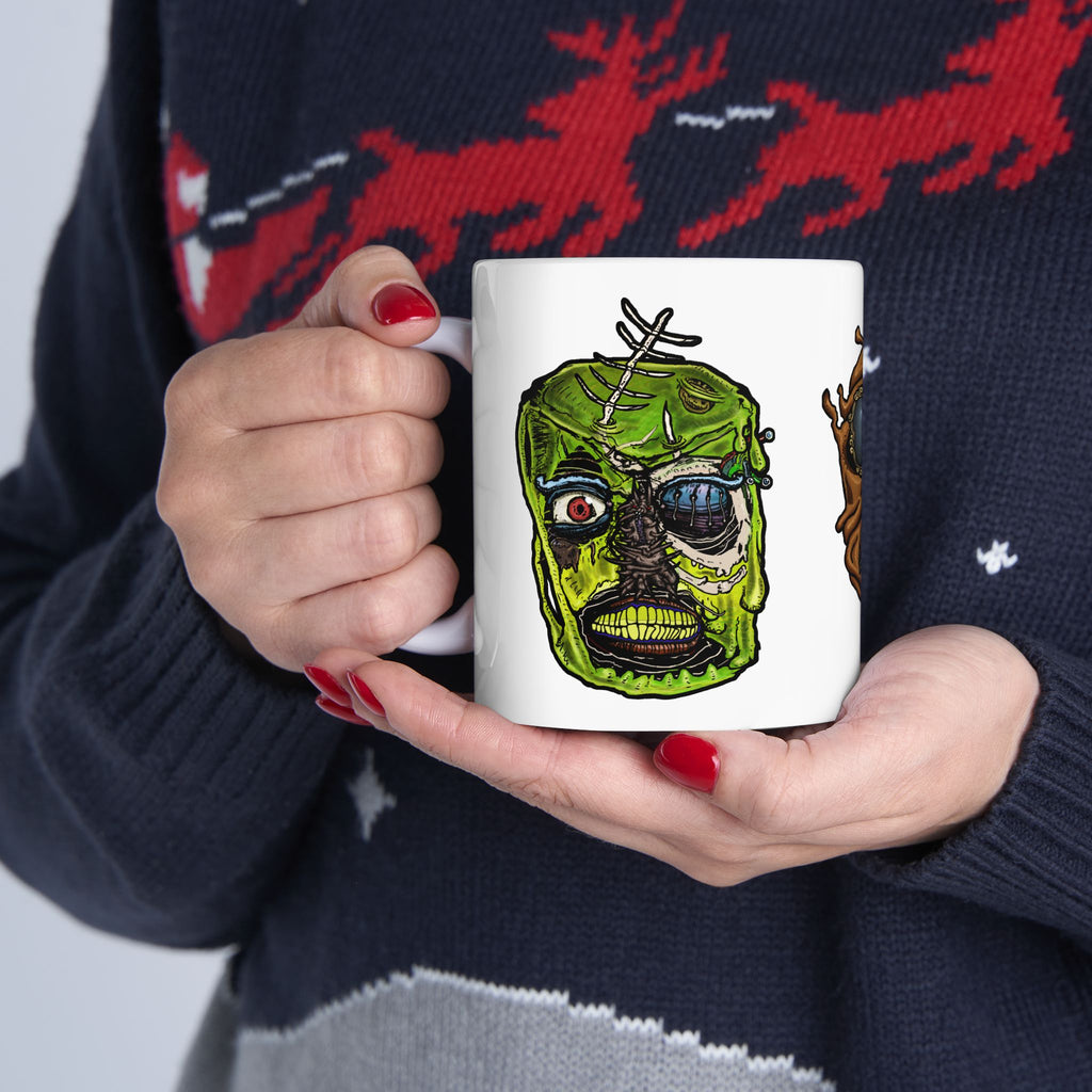 Freaky Features Sandman Radioactive Blob Shaman mug showing three monster designs: melting chocolate head with ice cream nose, neon green radioactive blob skull, and tribal shaman mask on white ceramic mug

