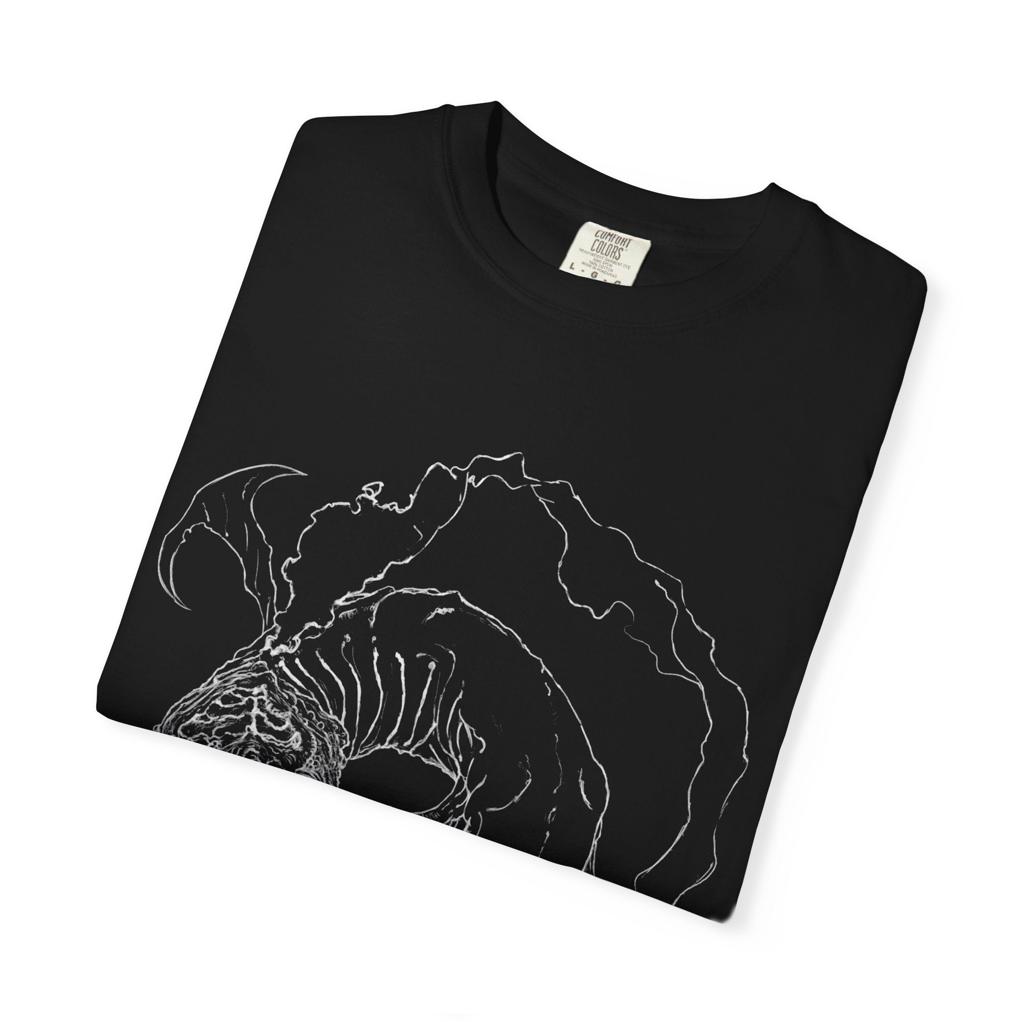 Hand-sketched Fish Monster t-shirt from Serenity Chain collection, eerie deep-sea creature with bulging eyes and flowing fins in white line art on black tee