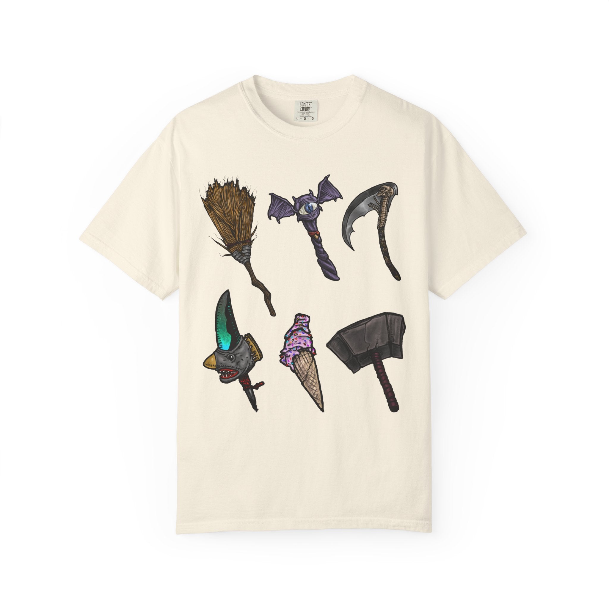 Hand-drawn Item Selection #1 t-shirt from Freaky Features showing a collection of monster weapons: broom, bat staff, skeletal scythe, shark dagger, ice cream cone and war hammer on dark gray tee
