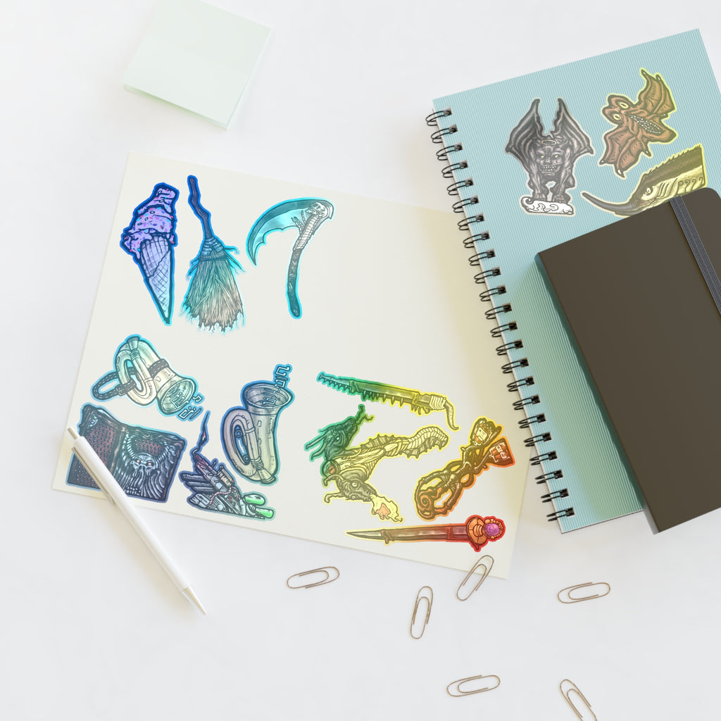 Freaky Features Sticker Sheet Set #4, transparent die-cut sheet with 14 hand-drawn weapons and creatures including ice cream cone, witch broom, skeletal scythe, bat-winged hellbeast, cursed tome and more

