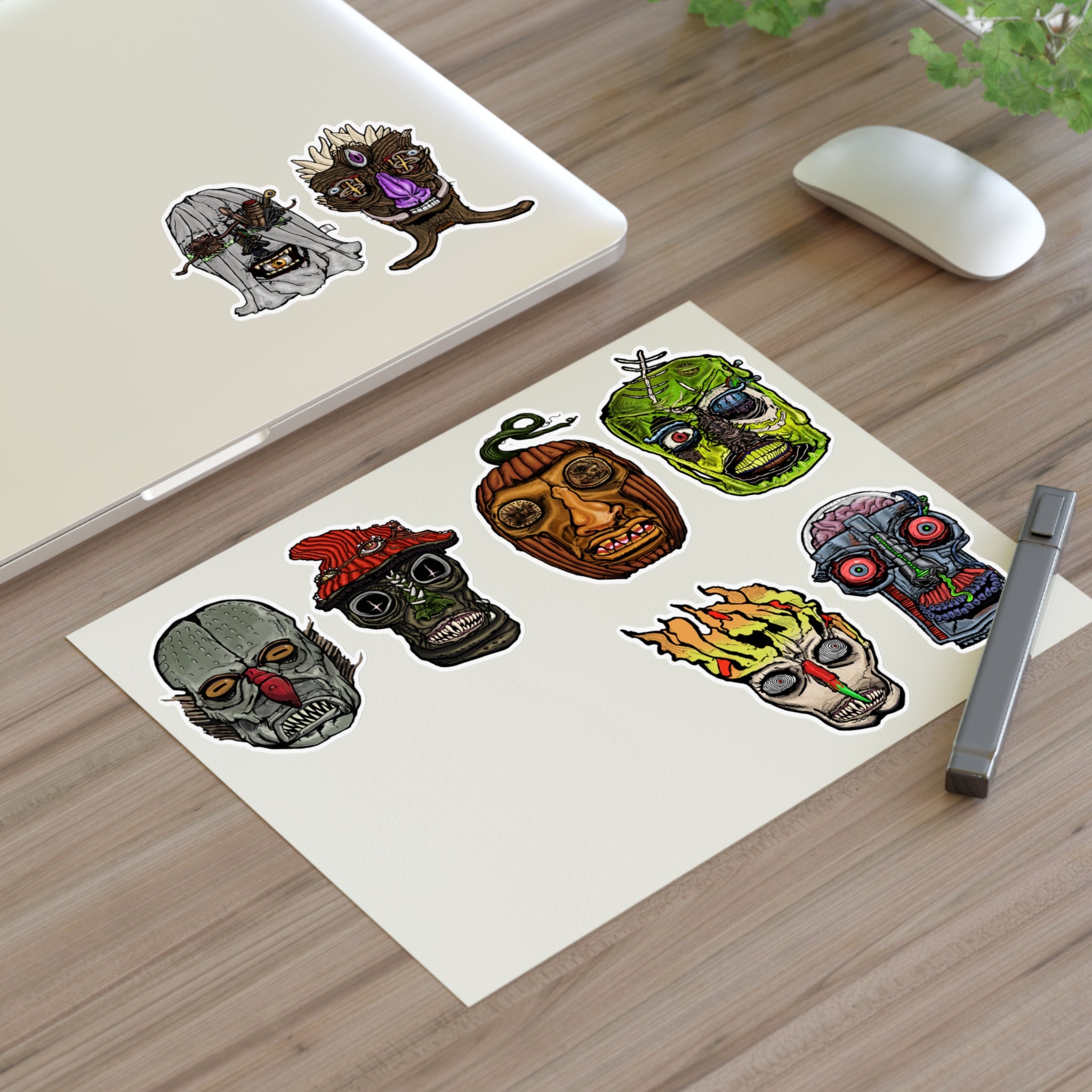 Freaky Features Sticker Sheet Set #2, transparent die-cut sheet with 8 hand-drawn monster heads including Fishman, Mushroom Boy, PumpkinJack, Radioactive Blob, Ghost, Flaming Skull, and Robo Bobo
