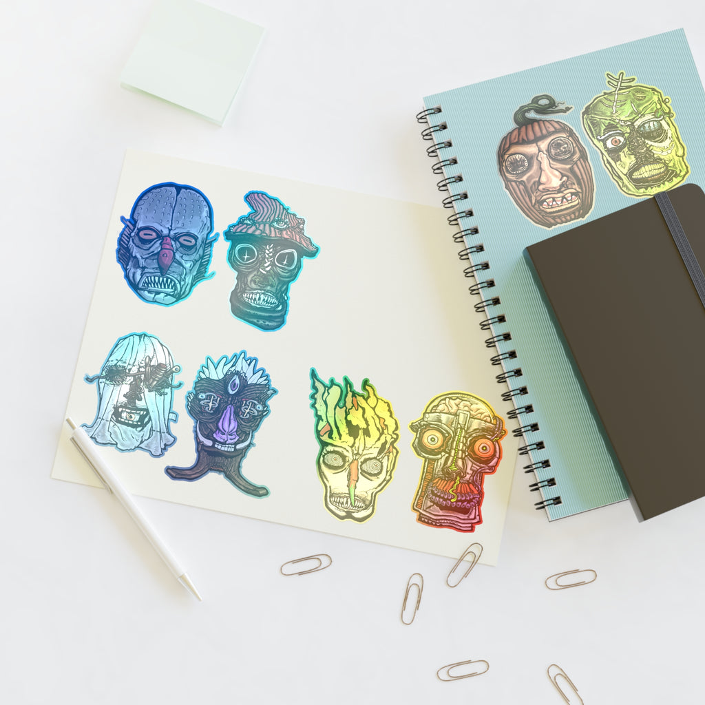 Freaky Features Sticker Sheet Set #2, transparent die-cut sheet with 8 hand-drawn monster heads including Fishman, Mushroom Boy, PumpkinJack, Radioactive Blob, Ghost, Flaming Skull, and Robo Bobo
