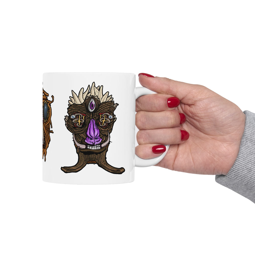 Freaky Features Sandman Radioactive Blob Shaman mug showing three monster designs: melting chocolate head with ice cream nose, neon green radioactive blob skull, and tribal shaman mask on white ceramic mug


